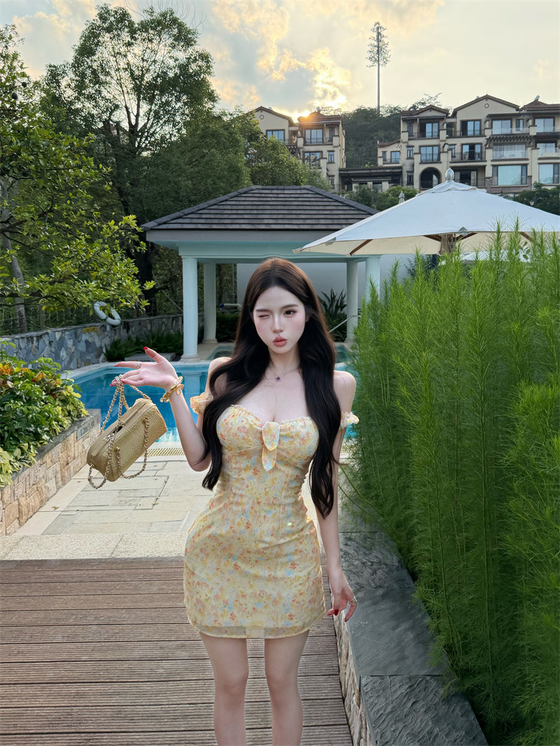 💕度假感碎花一字肩扭結泡泡木耳邊連衣裙